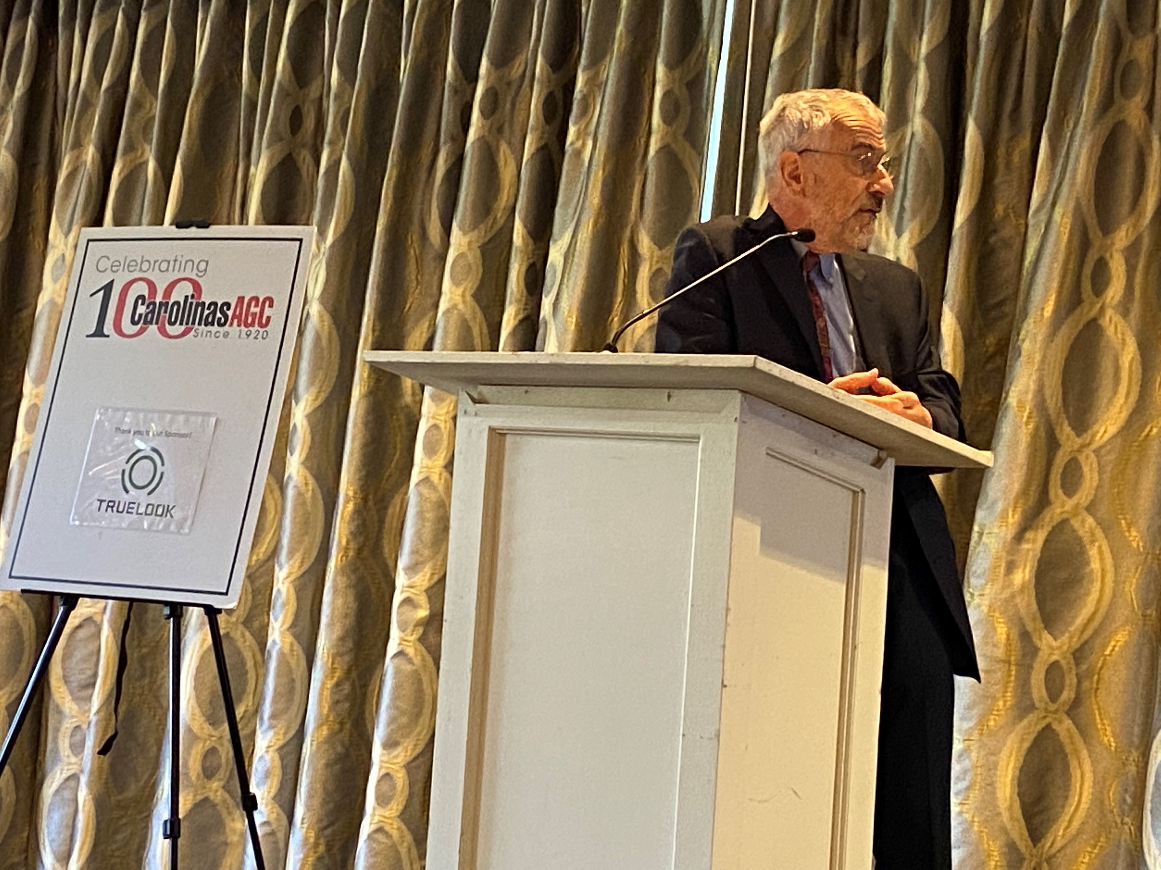 Ken Simonson speaks to members