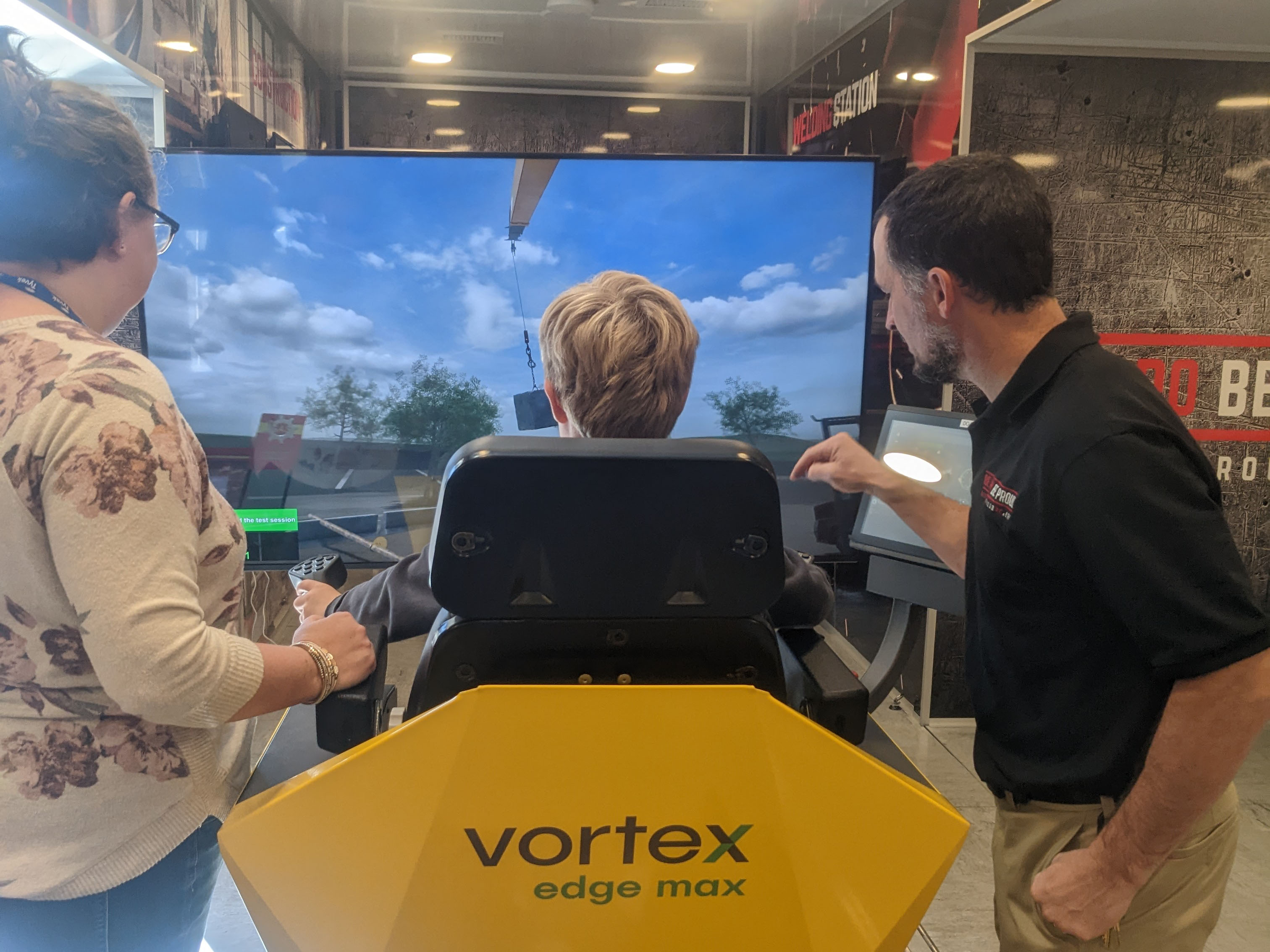 A student tries out the fork lift simulator